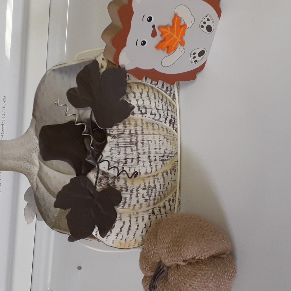 Americana fall decor tin painted pumpkin and jute pumpkin and wooden porcupine
